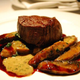 Beef tenderloin with vegetables in red sauce